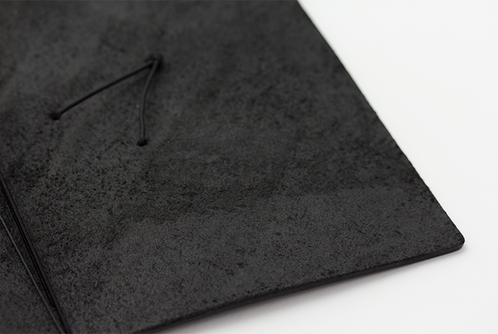 Each TRAVELER'S notebook features soft black leather. 