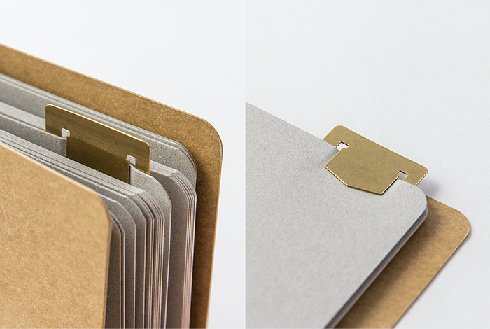 The Alphabet Brass Bookmark can mark the pages of your Midori Traveler's Notebook. 