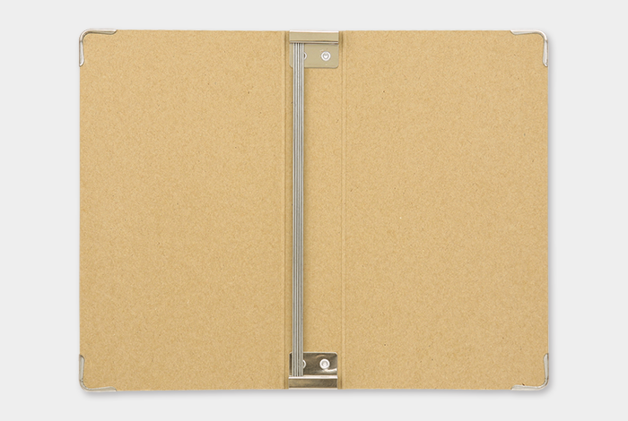 The Binder uses metal rods to hold Midori Traveler's Notebook Refills. 