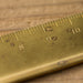 The Midori Ruler is made of brass so it will wear overtime and change with your use. 