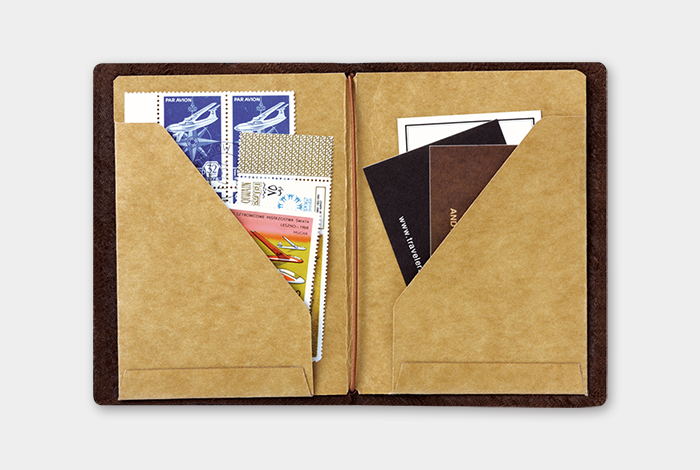 Use the Passport Size Kraft File to store tickets or stamps or paper scraps in your TRAVELER'S notebook. 