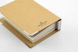 Kraft binder measures approximately 4.1 wide by 5.6 inches high by 1.6 inches deep. 