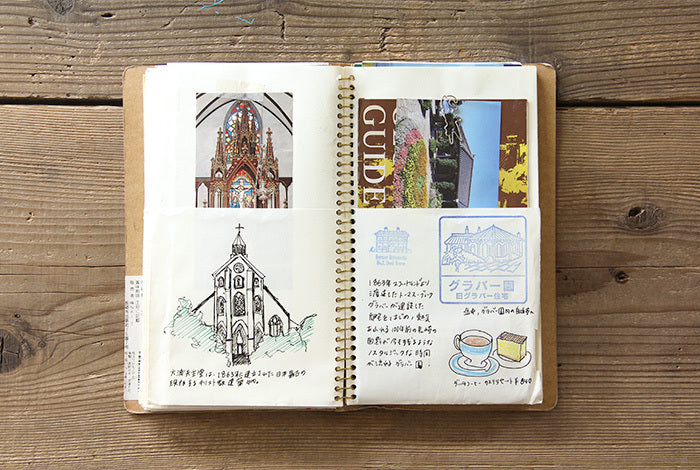The generously sized gold spiral binding allows plenty of room for filling the pockets with travel treasures! 
