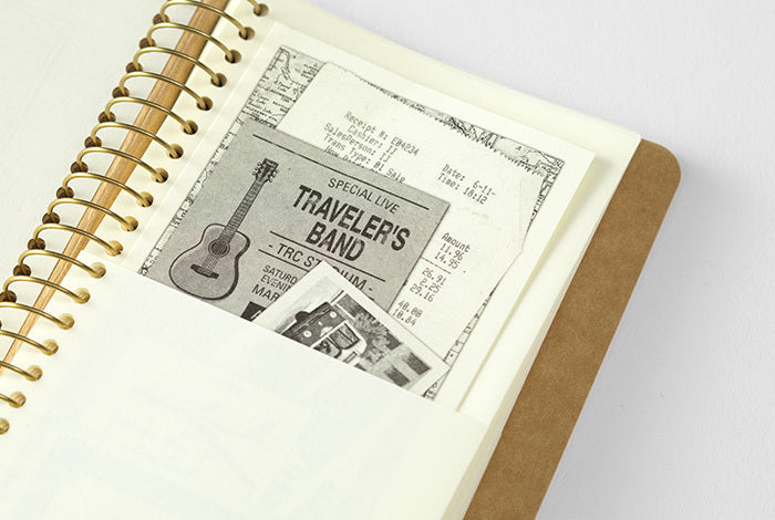 Traveler's Company Spiral Ring Paper Pocket Notebook contains 16 sheets and 32 pockets total. 