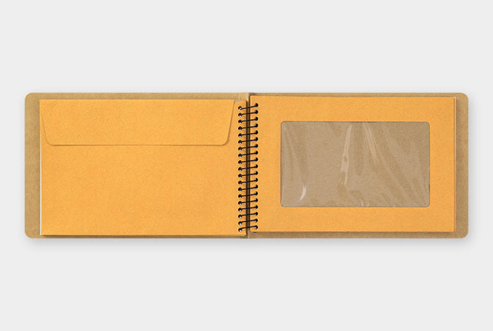 Midori Spiral Ring Notebook- Window Envelope B6 Honeybee- each sheets features a pocket that fits postcards, photos and  any ephemera you might collect on your journey. 