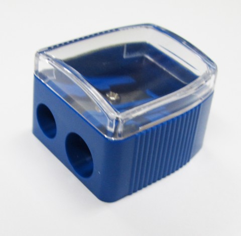 2 hole pencil sharpener with clear plastic top and blue base with 2 hole sizes